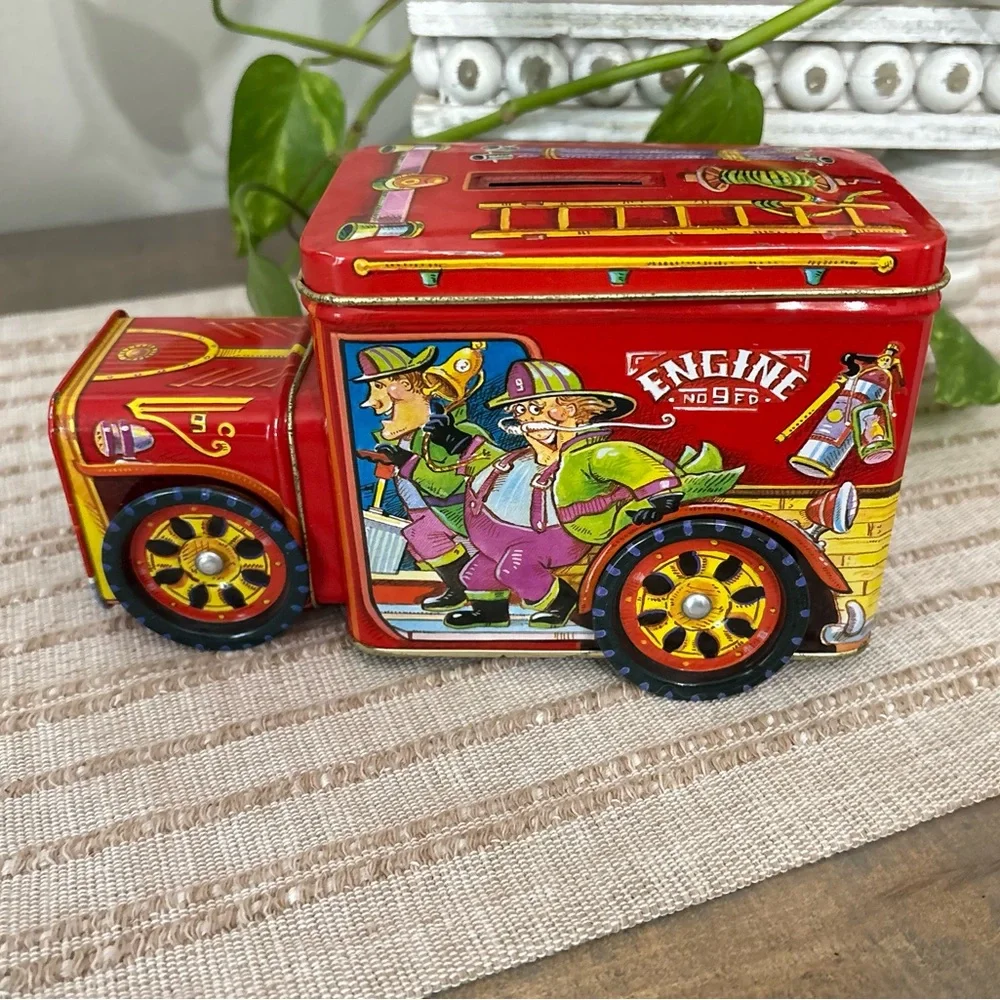 Vintage Fire Truck Bank- from part comes Off main- Actually rolls around.